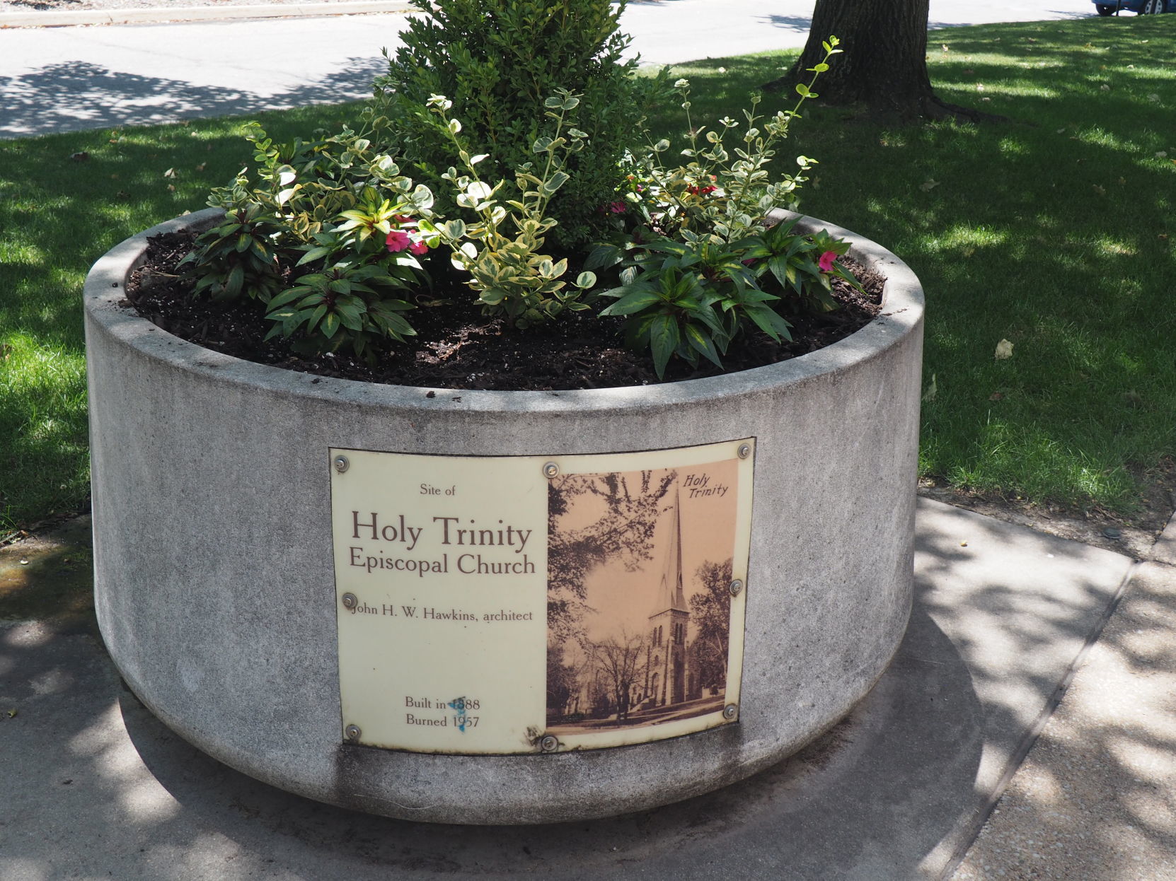 Holy Trinity planter displays historic pictures